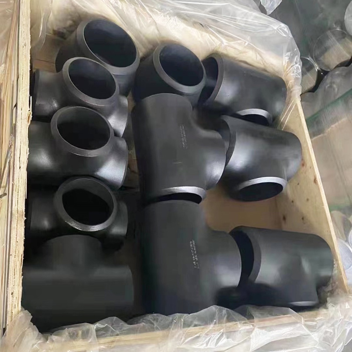 Butt weld tees packed in wooden box